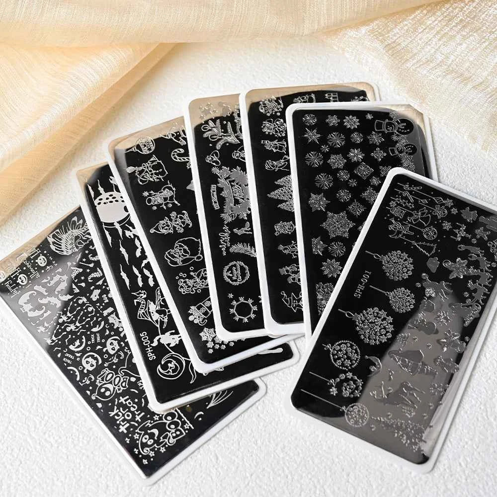 Plaques de stamping pour ongles Noël - Modèles d'art pour ongles avec flocons de neige, rennes et bonhommes de neige